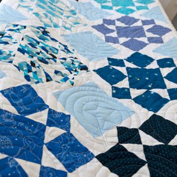 Constellations Quilt – on the quilting frame
